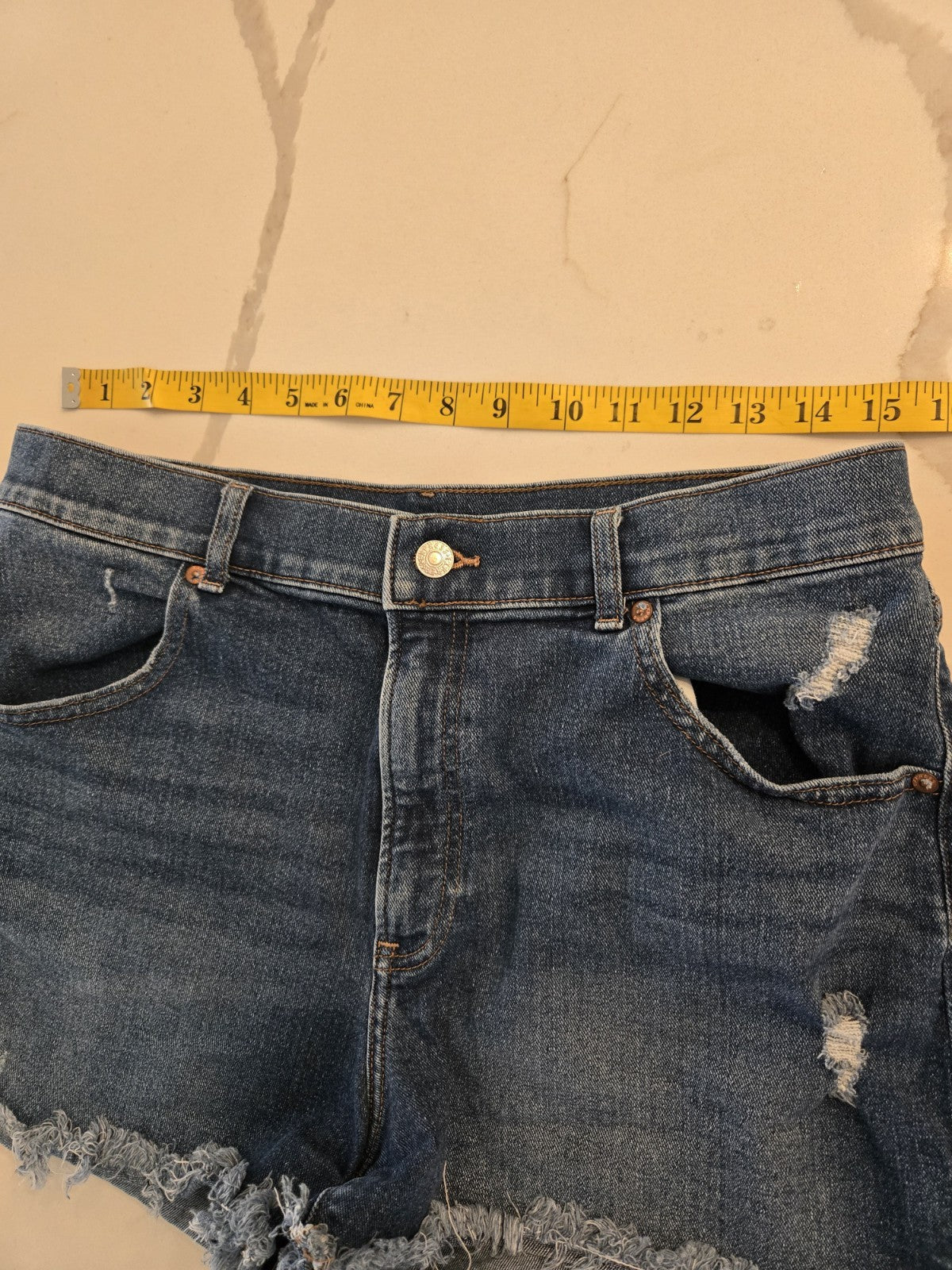 EXPRESS Size 12 Distressed Denim Shorts Womens Frayed Raw Hem Blue Jean