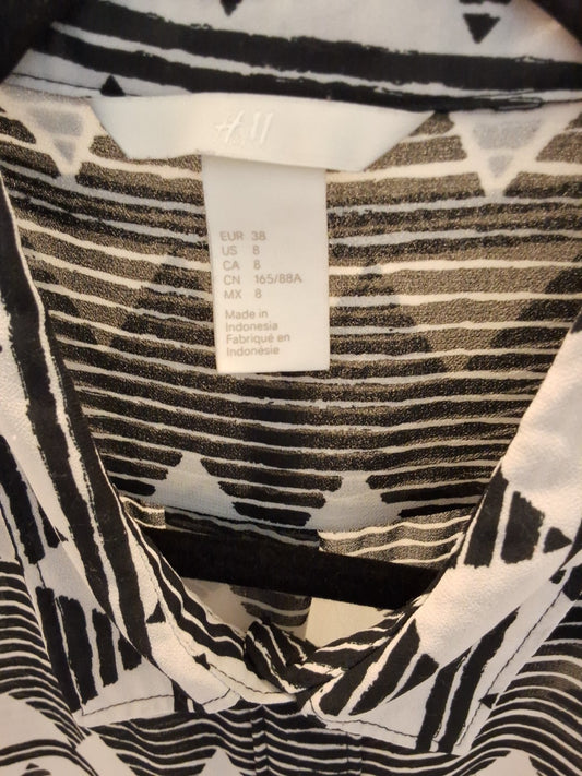 H&M Black & White Tribal Geometric Sleeveless Button Down High Low Blouse
